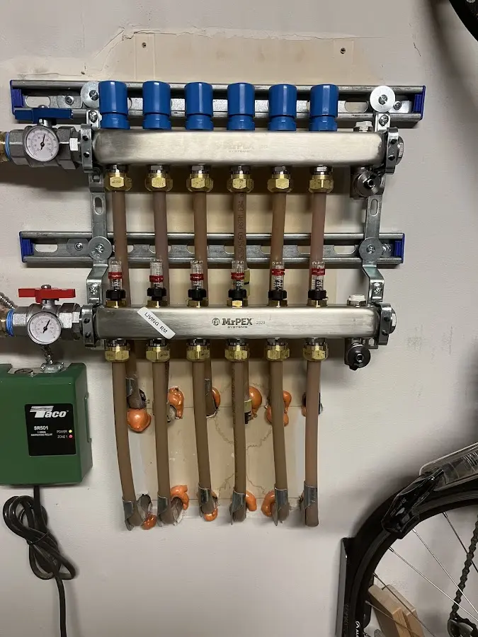 Plumber performing Gas Line Installation at a residential property in Toledo